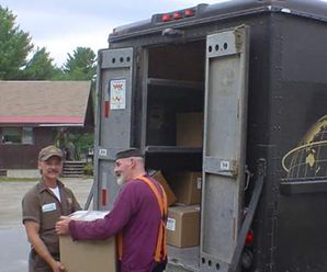 Charlie and Bob from Brown loading up the day's work to travel from Kingfield to all over the country